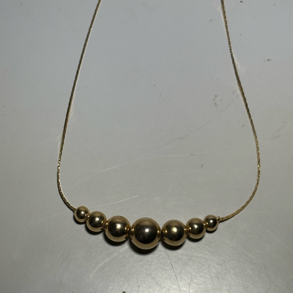 Elegant Gold Bead Necklace